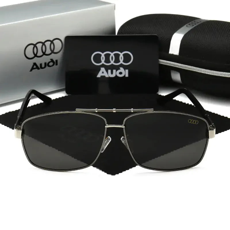 Front view of the Audi Q5 sunglasses with box, zippered case, cleaning cloth and card